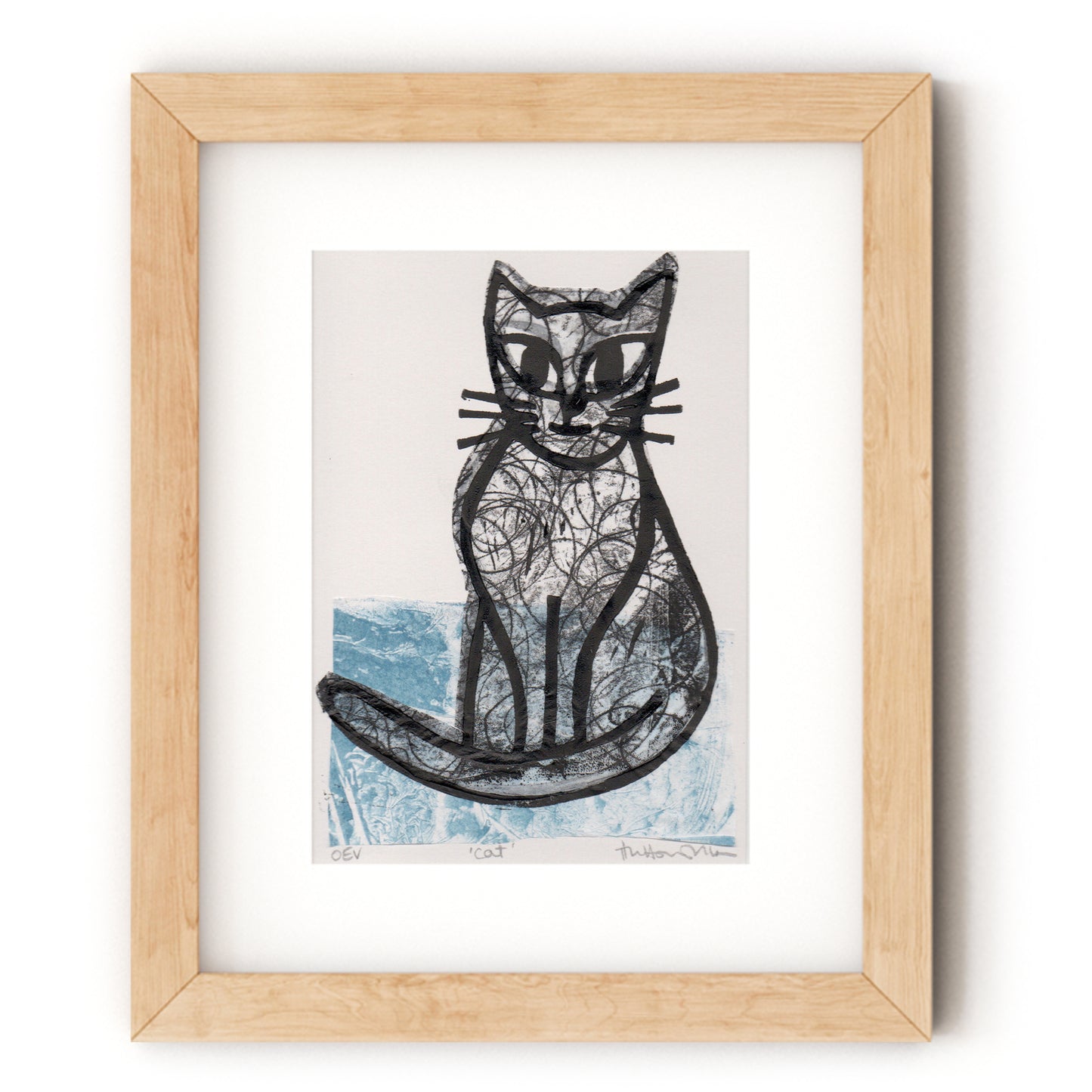 Cat 1 lino print shown in wood frame